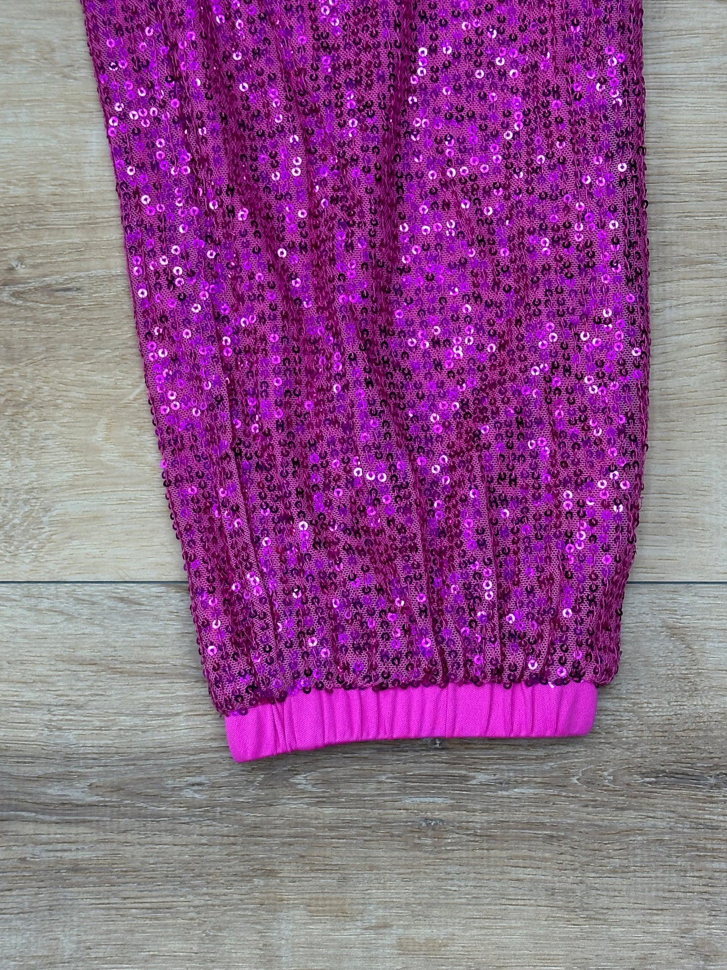 Pantalón jogger de brillo rosa