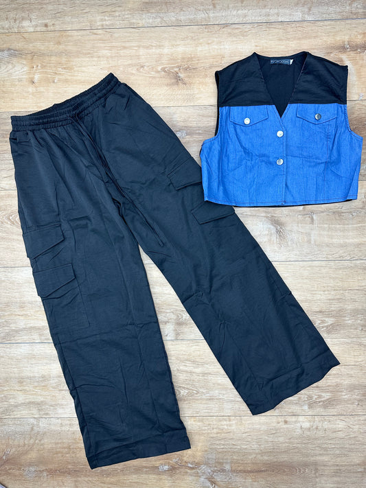 Conjunto de pantalón y chaleco, negro.