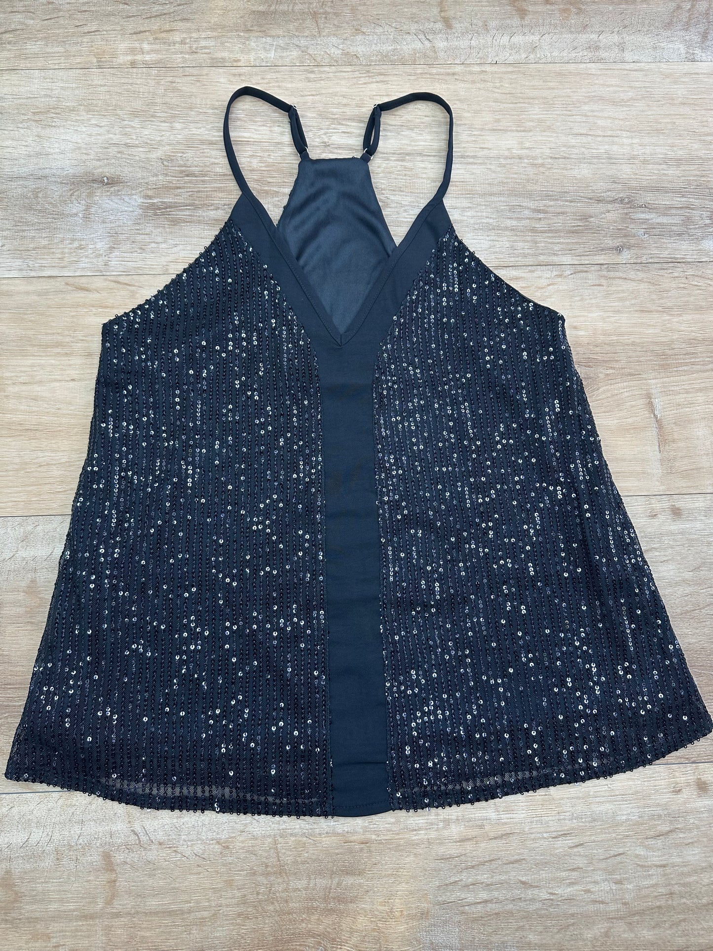 Blusa negra de brillo