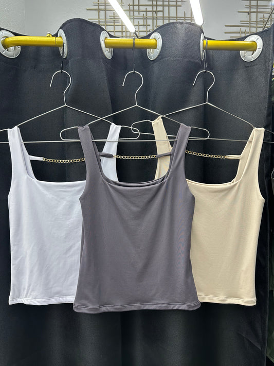 Blusa sin mangas d vestir. Color crema claro